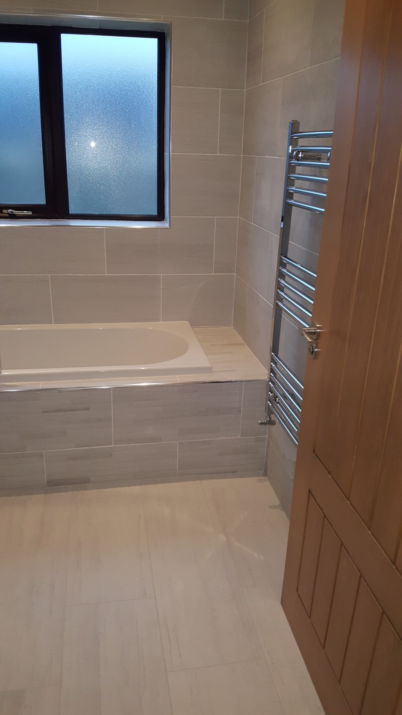 Tiled bath surround in a Carrick-on-Shannon home by North West Tiles & Timber, Ireland